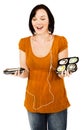 Smiling woman listening media player Royalty Free Stock Photo