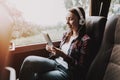 Smiling Woman Listening Music in Tourist Bus Royalty Free Stock Photo