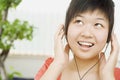 Smiling Woman Listening to Headphones