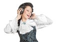 Smiling woman listening to music in headphones. Royalty Free Stock Photo