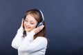 Smiling woman listening to music in headphones Royalty Free Stock Photo