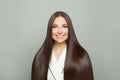 Smiling woman with long healthy straight hair on white background. Haircare concept Royalty Free Stock Photo