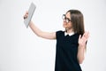 Smiling woman making video chat on tablet computer Royalty Free Stock Photo