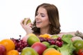 smiling woman with many fruits