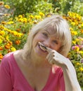 Smiling woman with mustache