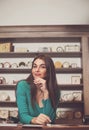 Smiling woman next to table