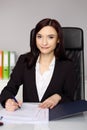 Smiling woman notary public notarizes the power of attorney Royalty Free Stock Photo