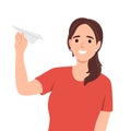 Smiling woman with paper plane in hands. Businesswoman with paperwork airplane