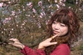 Smiling woman and Peach Flower