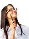 Smiling woman with pen and glasses Royalty Free Stock Photo
