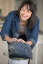 smiling woman with plastic rubbish sack Royalty Free Stock Photo