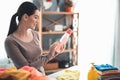 Smiling woman preparing for laundry at home Royalty Free Stock Photo