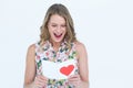 Smiling woman reading love letter