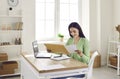 Smiling woman receive postal mail with important document, invitation or bank message.