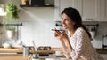 Smiling woman record voice message on cellphone Royalty Free Stock Photo