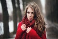 Smiling woman in red scarf walking in park Royalty Free Stock Photo