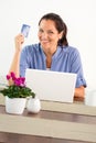 Smiling woman shopping online home credit card Royalty Free Stock Photo