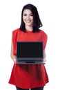 Smiling woman showing laptop screen Royalty Free Stock Photo