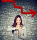 Smiling woman showing time out gesture on stress gray background Royalty Free Stock Photo