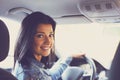 Smiling woman sitting in a car Royalty Free Stock Photo