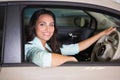 Smiling woman sitting at the wheel of her new car Royalty Free Stock Photo