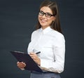 Smiling woman social employee writes on clipboard.