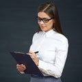 Smiling woman social employee writes on clipboard.