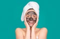 Smiling woman spa mask, beauty concept healthy portrait. Mud facial mask, face clay mask spa. Beautiful woman with Royalty Free Stock Photo