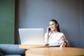 Smiling woman student having cellphone call after learning Royalty Free Stock Photo