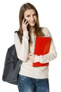 Smiling woman student talking on cell phone Royalty Free Stock Photo