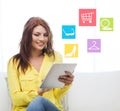 Smiling woman with tablet pc computer at home Royalty Free Stock Photo