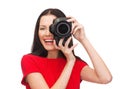 Smiling woman taking picture with digital camera Royalty Free Stock Photo