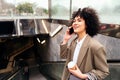 smiling woman talking by phone on the escalator Royalty Free Stock Photo