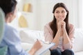 Smiling woman talking to wellness coach about motivation
