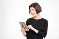 Smiling woman using tablet computer Royalty Free Stock Photo