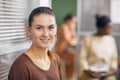 Smiling Woman Waiting in Office Royalty Free Stock Photo