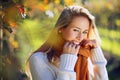 Smiling woman in warm autumn light