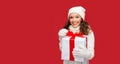 Smiling woman in white clothes with gift box Royalty Free Stock Photo