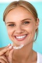 Smiling Woman With White Teeth Holding Teeth Whitening Tray Royalty Free Stock Photo