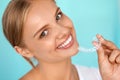 Smiling Woman With White Teeth Holding Teeth Whitening Tray Royalty Free Stock Photo