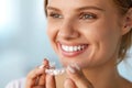 Smiling Woman With White Teeth Holding Teeth Whitening Tray Royalty Free Stock Photo