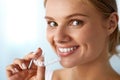 Smiling Woman With White Teeth Holding Teeth Whitening Tray Royalty Free Stock Photo