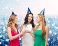 Smiling women holding glasses of sparkling wine Royalty Free Stock Photo