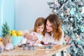 Happy family mother and daughter celebrating Merry Christmas and Happy New Year Royalty Free Stock Photo