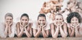 Smiling women lying in row for breast cancer awarness