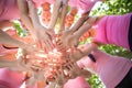 Smiling women organising event for breast cancer awareness Royalty Free Stock Photo