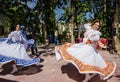 Smiling Women, Twirling Ribbon Skirts Flying - Puerto Vallarta, Royalty Free Stock Photo