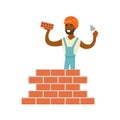 Smiling worker building a brick wall, colorful character vector Illustration Royalty Free Stock Photo