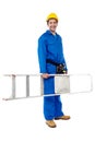 Smiling worker carrying a ladder Royalty Free Stock Photo