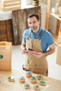 Smiling Worker Packaging Orders at Food Delivery Royalty Free Stock Photo